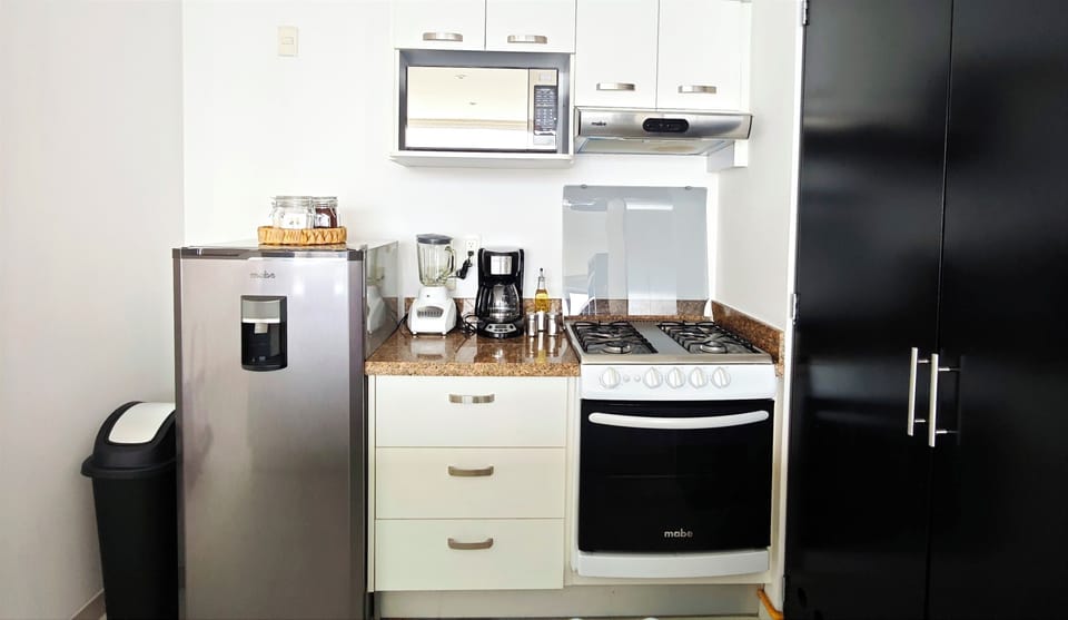 Enjoy a fully equipped eat-in kitchen with stylish décor accents—perfect for cooking, dining, and relaxing in comfort.