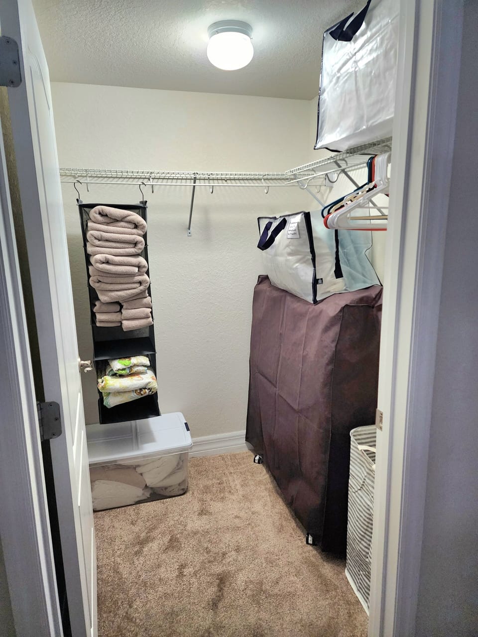 2nd bedroom closet with rollaway, twin, bed