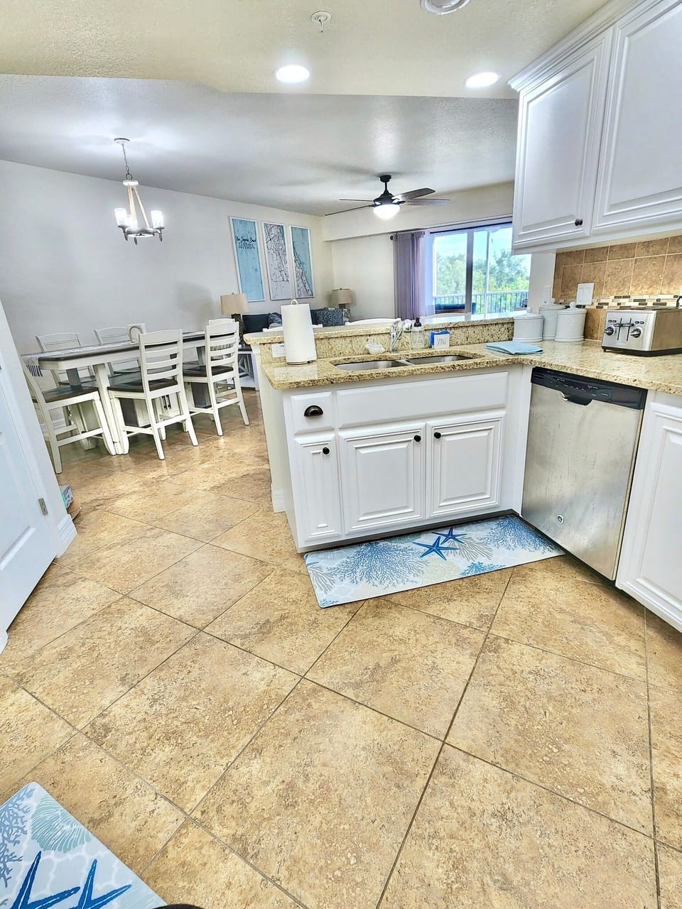 Kitchen looking into dining/living area