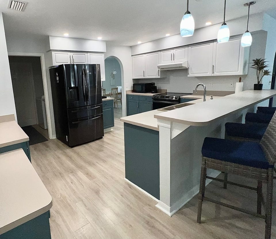 Open concept kitchen with full size appliances