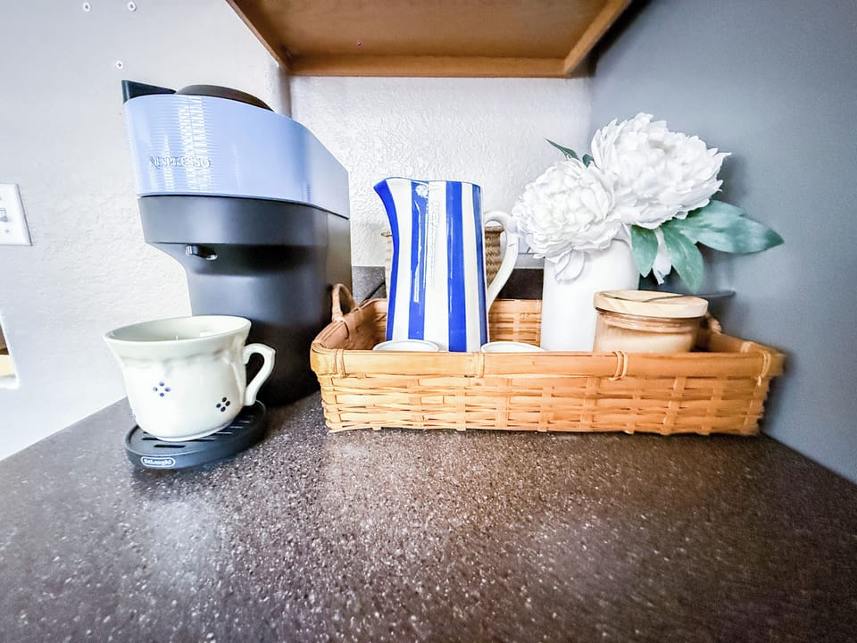Nespresso machine with pods and sugar