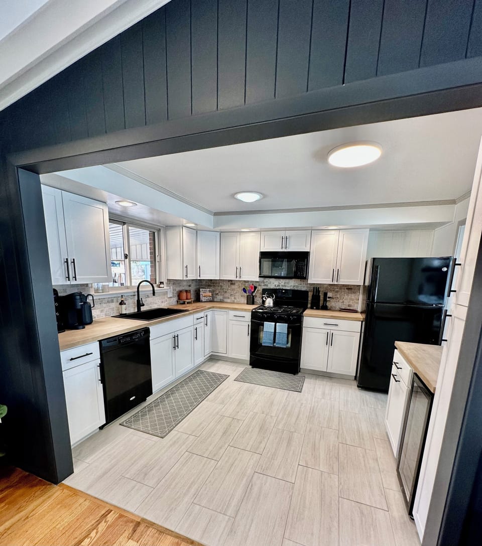 Kitchen area with wine fridge
