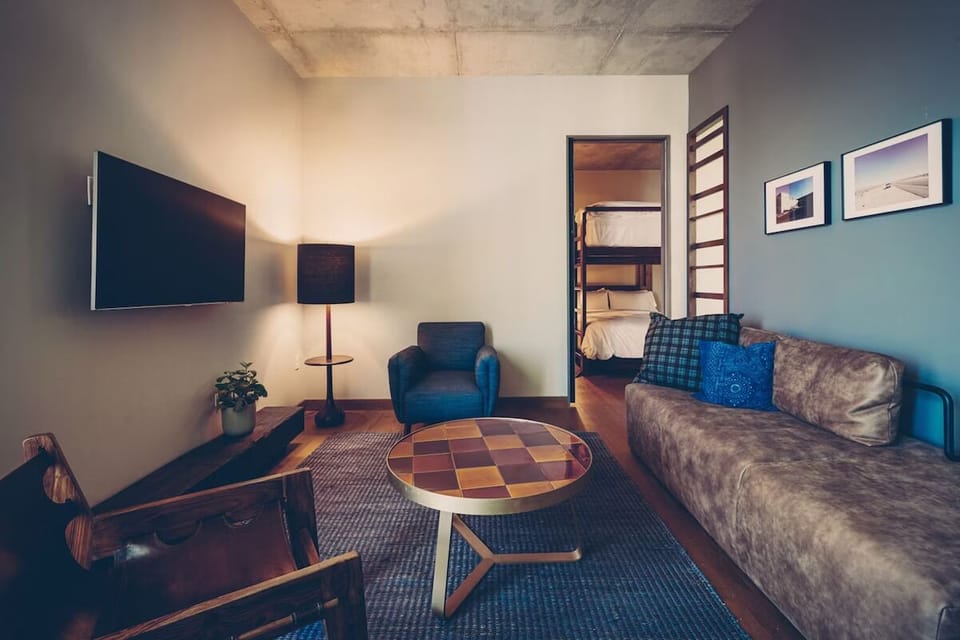 Kick back for movie nights in a cozy, design-forward lounge.