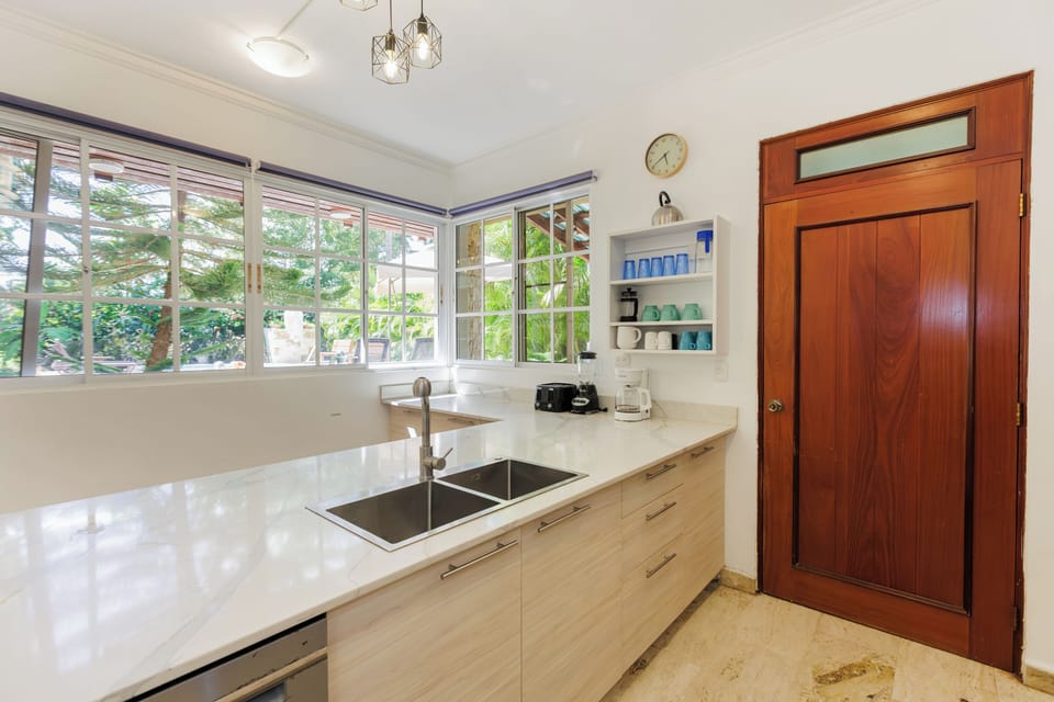 Fully equipped kitchen with modern appliances and ample space