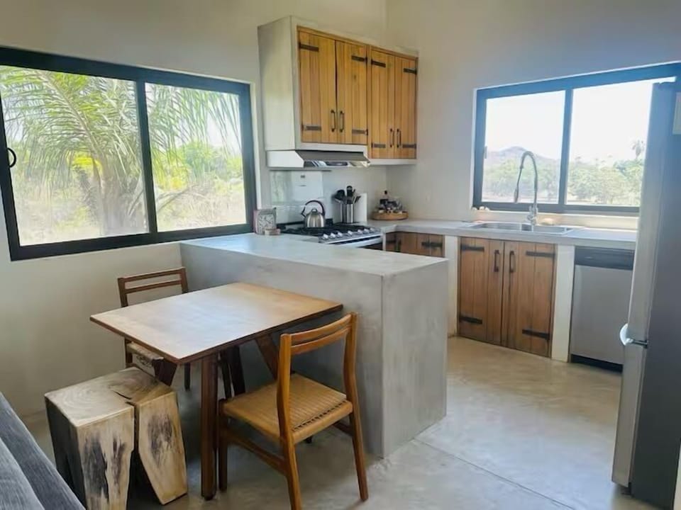 Kitchen + indoor dining space. 