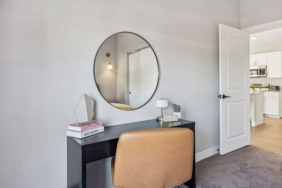 This cozy workspace with warm lighting, and a creative wall display, perfect for productivity.