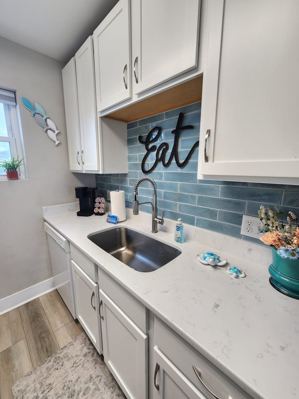 Brand new coastal colored backsplash brings the good and happy vibes!