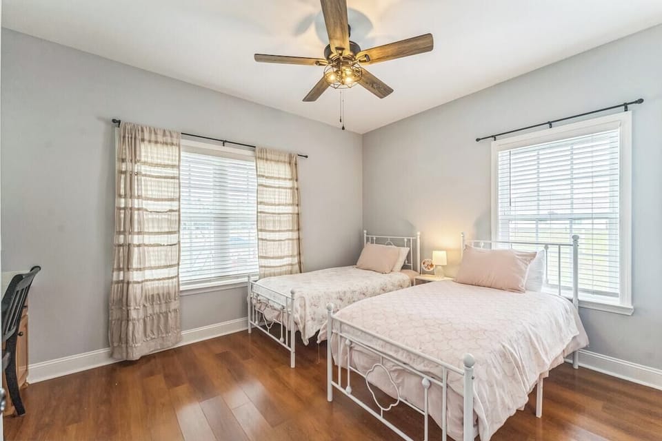 Perfect for kids or friends—this cozy room with twin beds offers comfort, charm, and restful nights.
