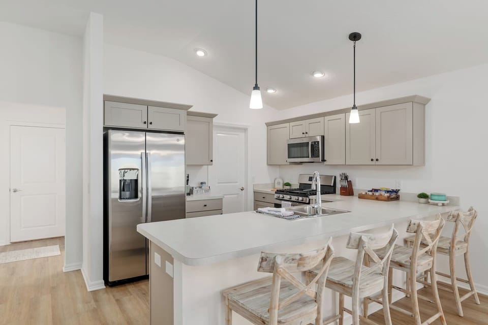 Beautiful and fully stocked kitchen ready for you to enjoy with all that you could need to cook, bake or just get a snack!