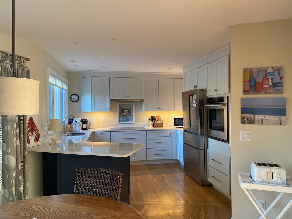Bright kitchen, generous counter space, modern appliances; the heart of the home