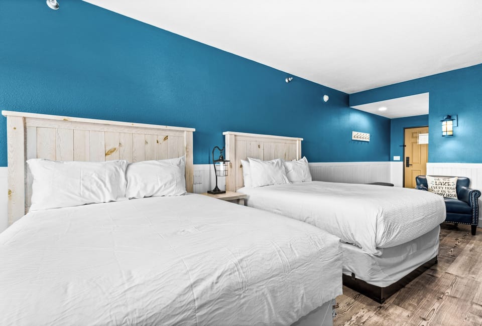 Two plush queen beds for a restful lakeside stay