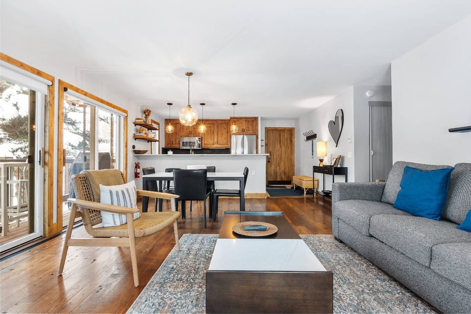 The open concept living space with Scandinavian design touches