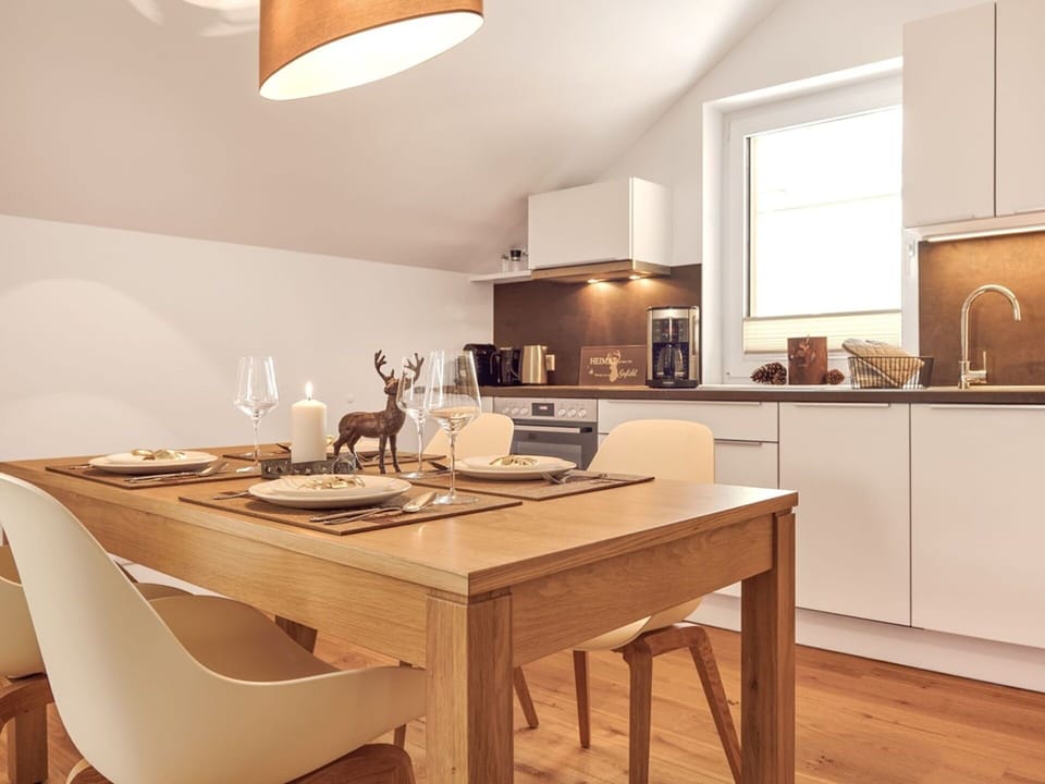Furniture, Interior Design, Flooring, Wood, Ceiling, Light Fixture, Floor, Kitchen & Dining Room Table, Chair, Room