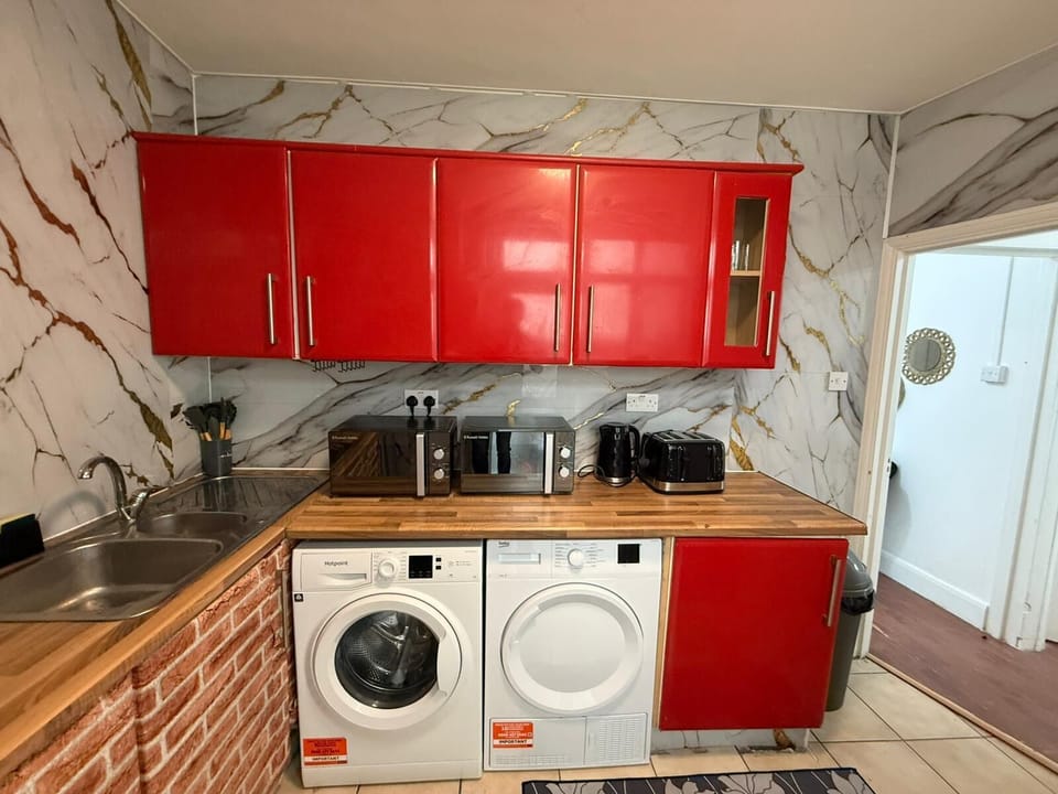 This photo represents the communal kitchenette
