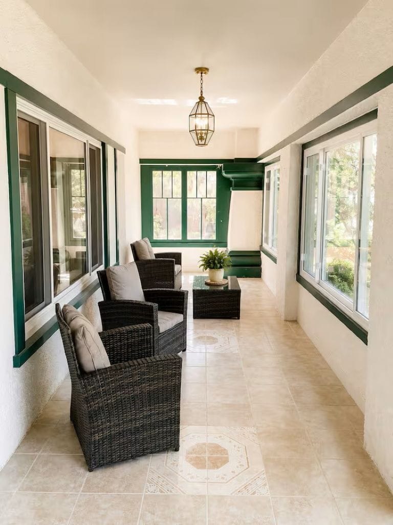 The spacious lake-facing three-season room offers beautiful waterfront views