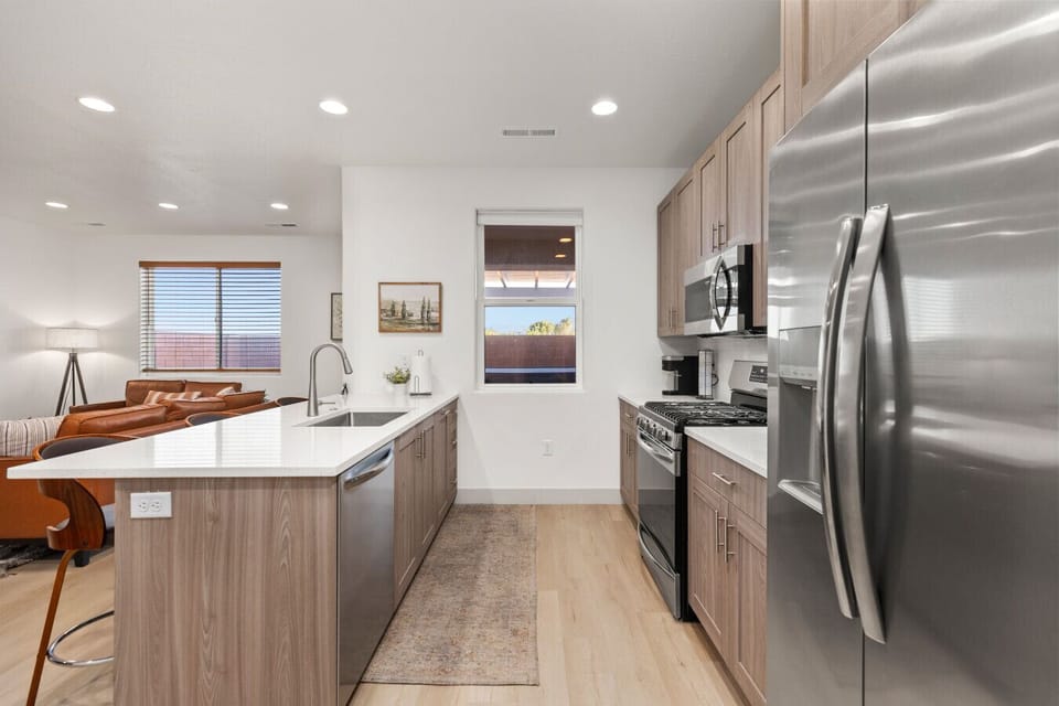 Sleek countertops and modern finishes elevate the space