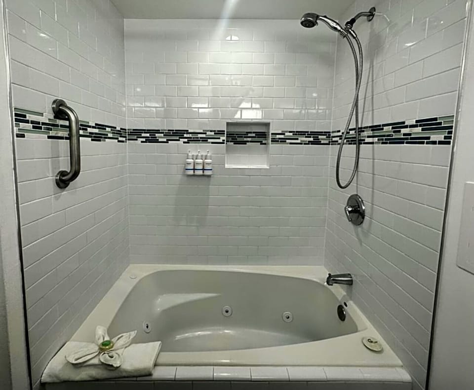 Soak or shower in a bright bath with spa-like comfort.