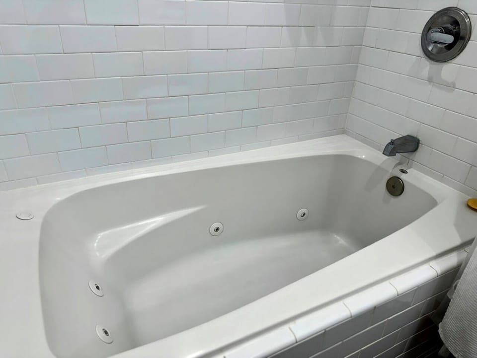 Slip into the jetted tub for a soothing, bubbly soak.