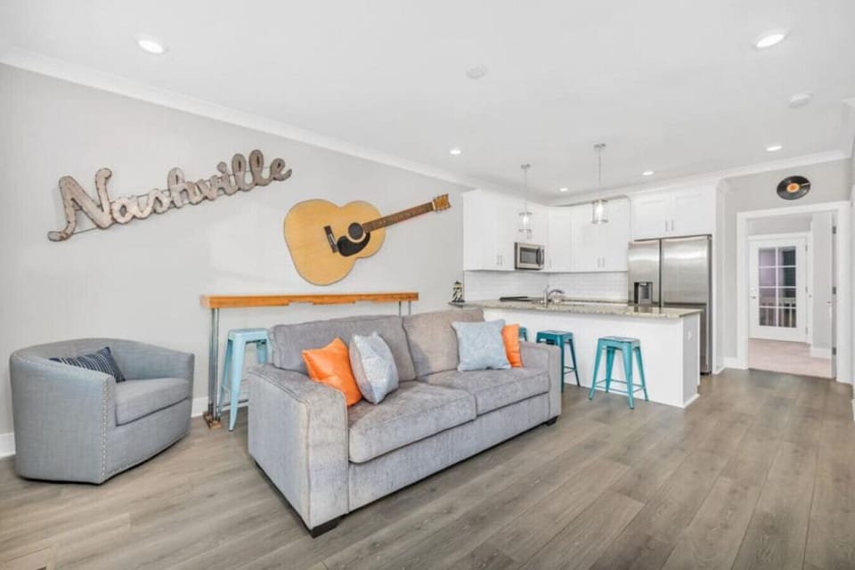 Gathering area open to the kitchen. Sofa pulls out for more sleeping options