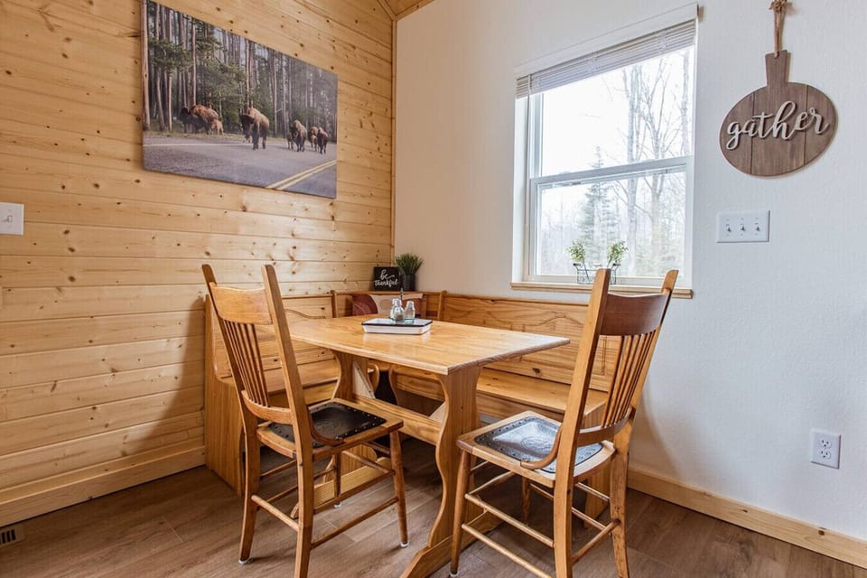 Enjoy intimate meals with a view of the woods.