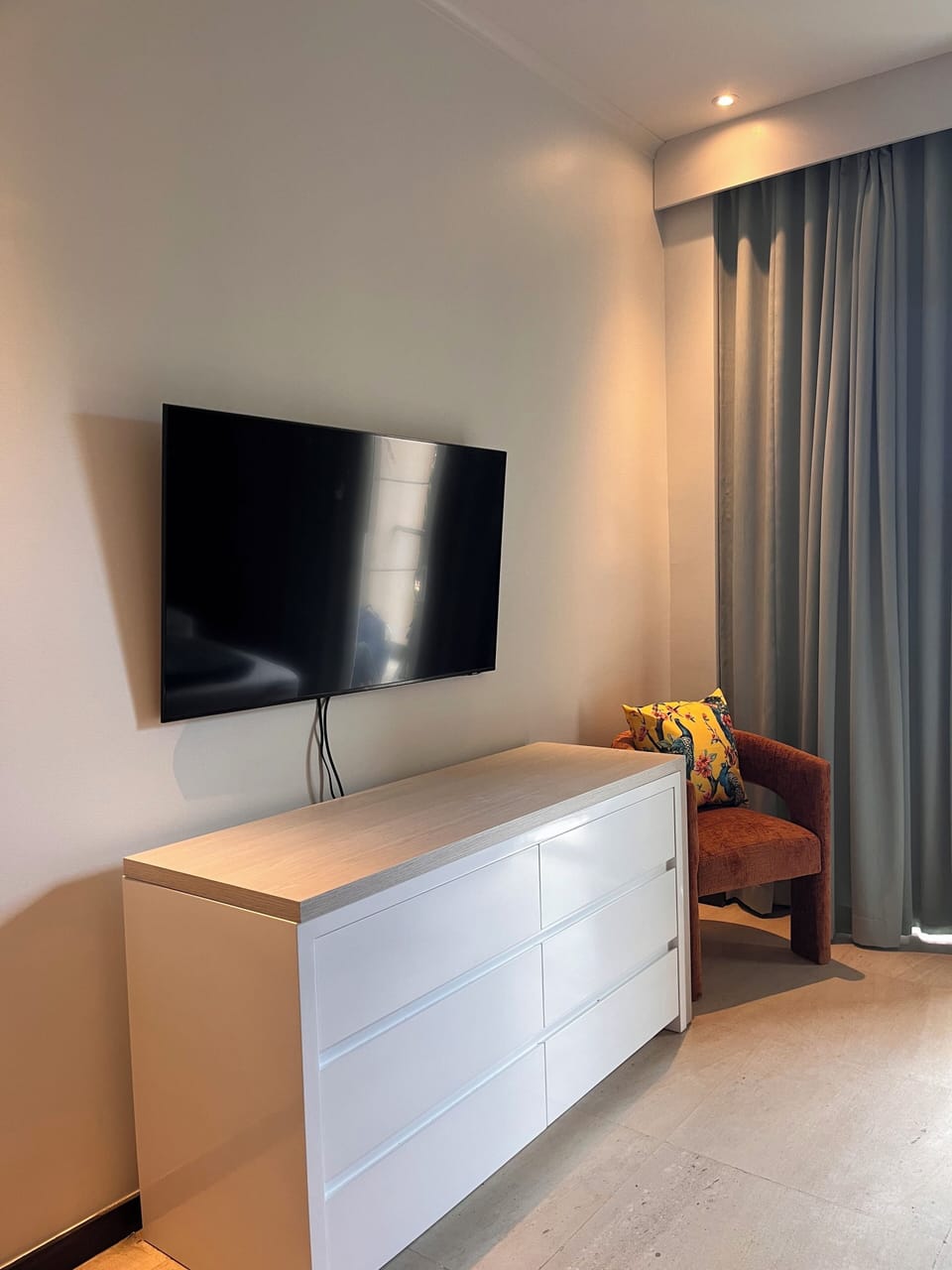 Second Bedroom with a Smart TV and dresser that converts to a partial desk.