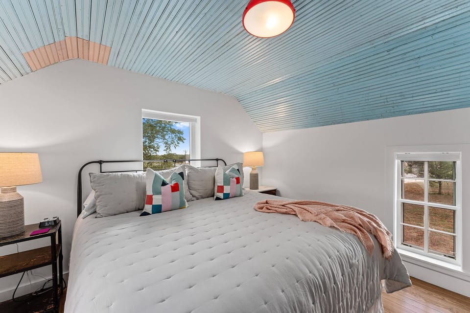 Wake up to laughter and late-night stories in a bedroom designed for reconnection. With rustic touches and airy windows, it’s the kind of room where everyone wants to bunk up and bond. This room connects to another room through a jack and jill bathroom