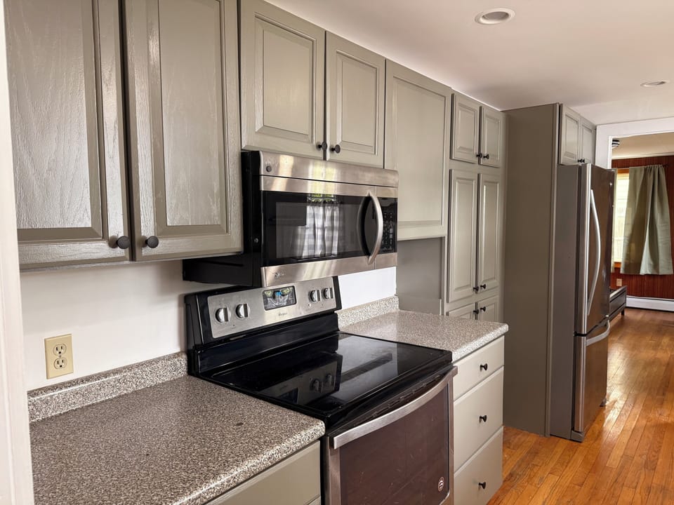 Newly renovated with additional cabinetry added and newer appliances.