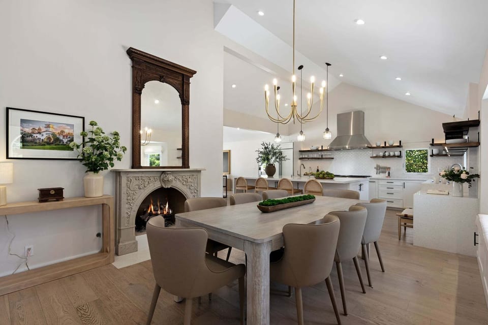 The home's fireplace adds a warm and cozy element to the dining area