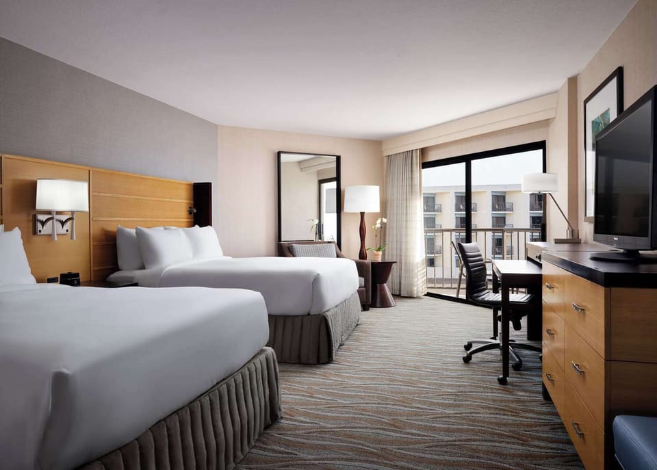 Rest easy in a bright room with balcony access.