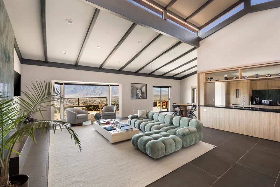 Spacious living area with seamless flow to the kitchen and outdoors.