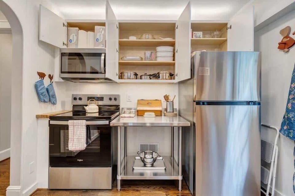 Fully equipped kitchen with cookware and essentials