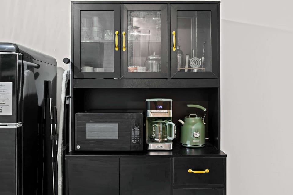 Kitchenette: Enjoy the fridge, microwave oven, coffee maker and water kettle. 