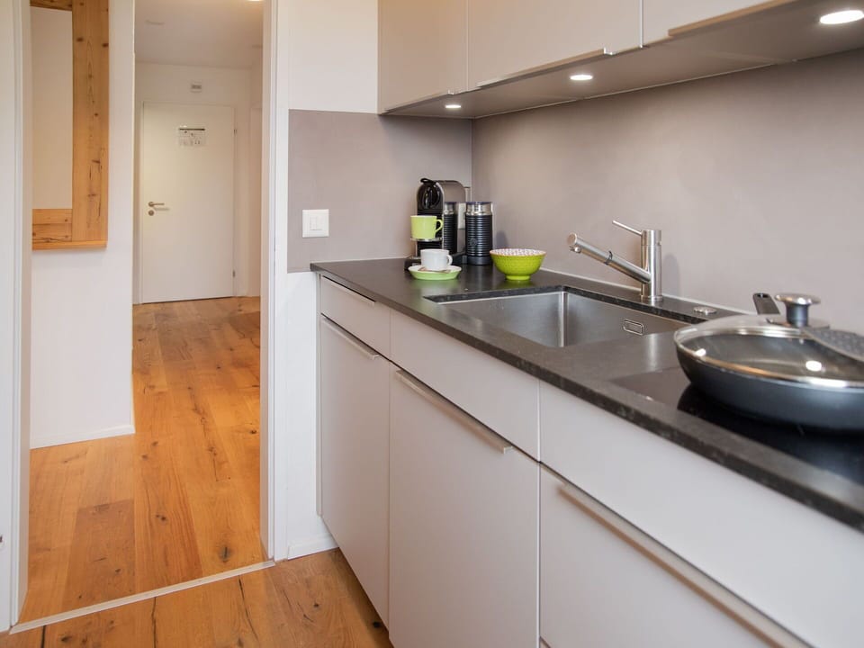 Countertop, Kitchen, Interior Design, Kitchen Sink, Kitchen Appliance, Flooring, Cabinetry, Wood, Sink, Plumbing Fixture