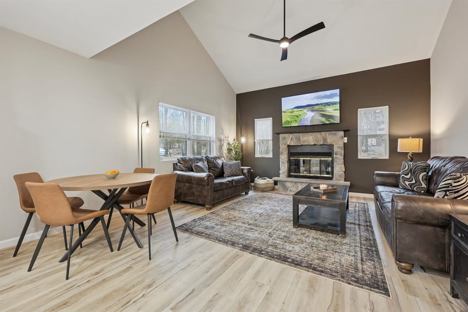 Gather around the open-concept living room with comfortable seating for the whole group