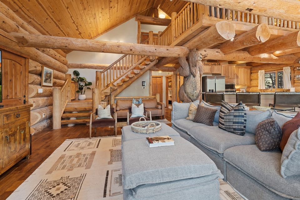 Cozy living area with warm textures and classic lodge character