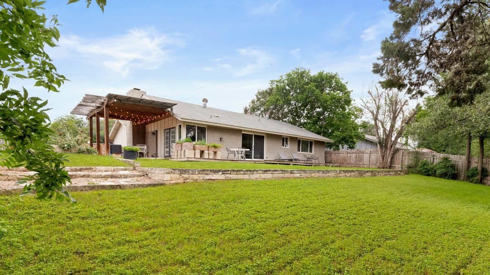 4 Bedroom Home Exterior and Lush Garden
