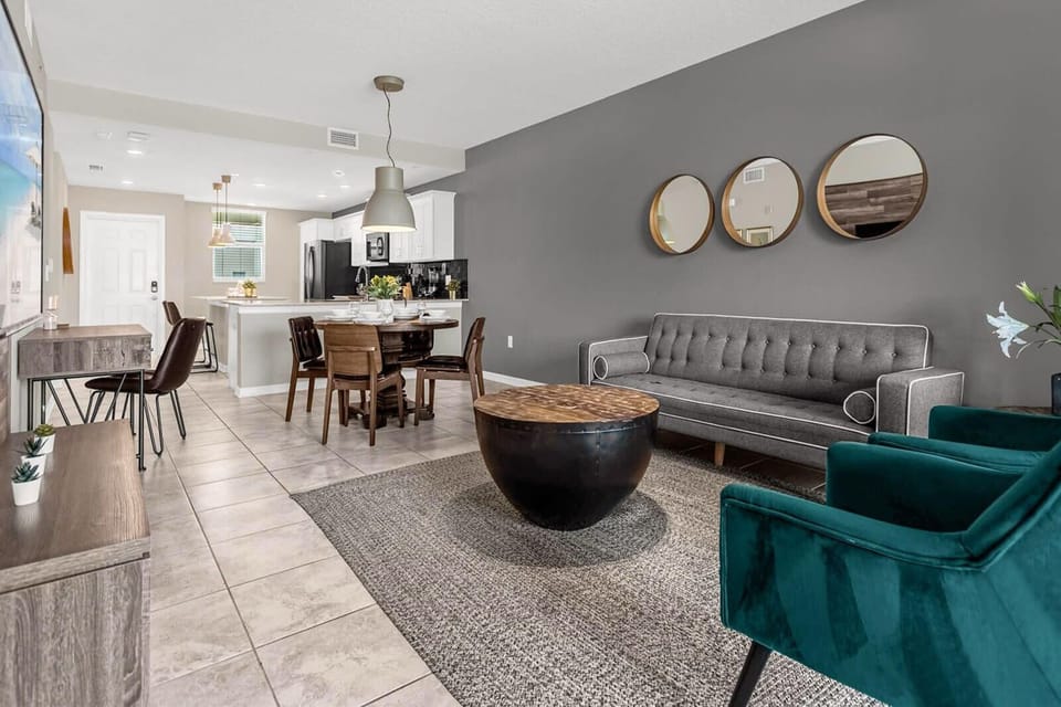 Bright And Open Dining And Living Space Perfect For Relaxation And Gatherings
