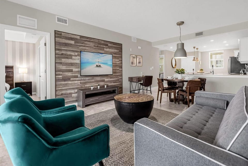 Relax In The Stylish Living Room Designed For Comfort And Entertainment