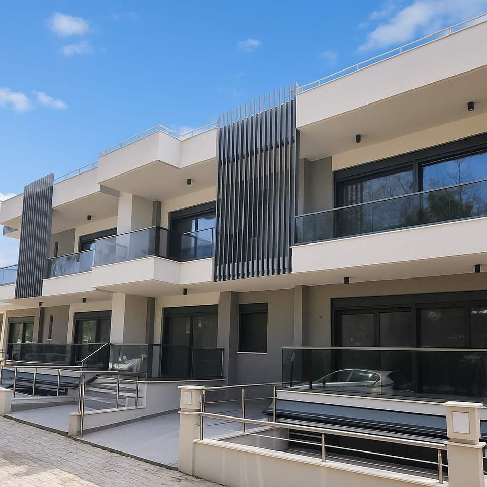 Contemporary Building Exterior – Secure, stylish structure just moments from the beach.

