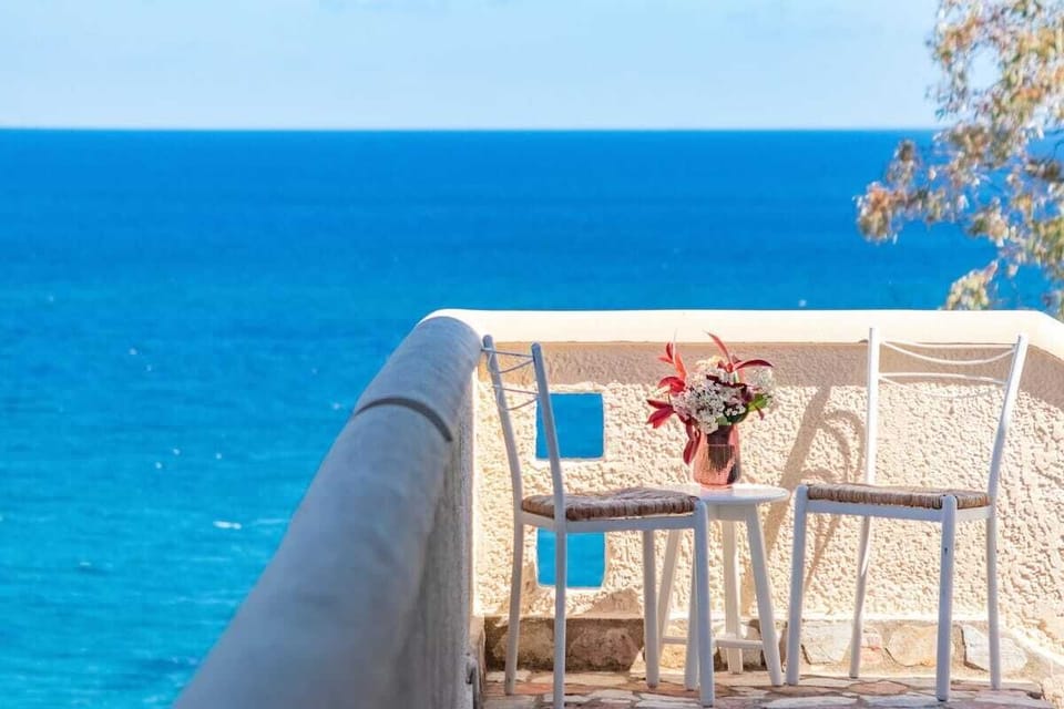 Second Balcony View with Coffee Table Overlooking the Deep Blue Sea
A private spot for two with uninterrupted ocean views — ideal for breakfast or peaceful moments during the day.