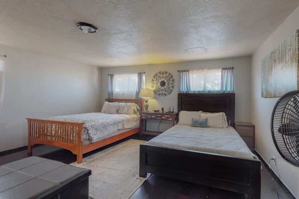Two comfy queen beds upstairs 
