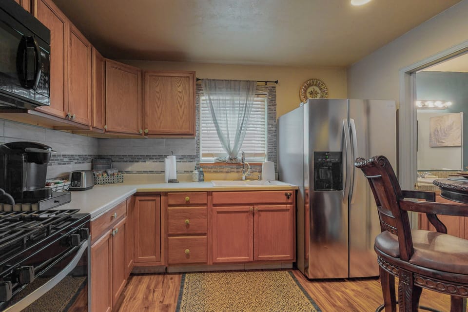 Full kitchen with cookware to make and serve a simple meal