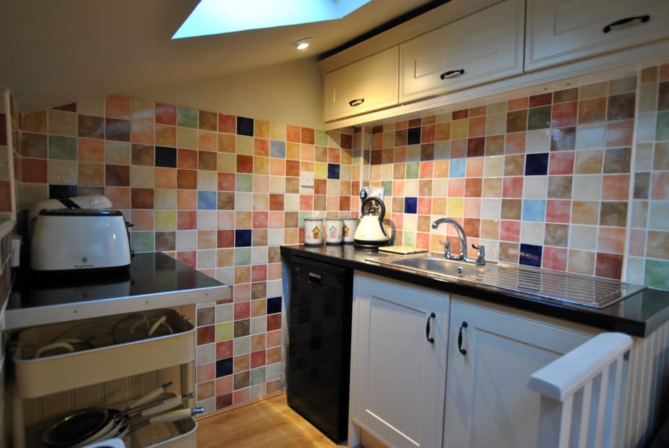 The split level kitchen makes good use of space