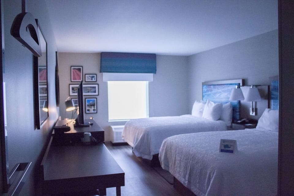 Recharge after adventures in a roomy double-bed layout.