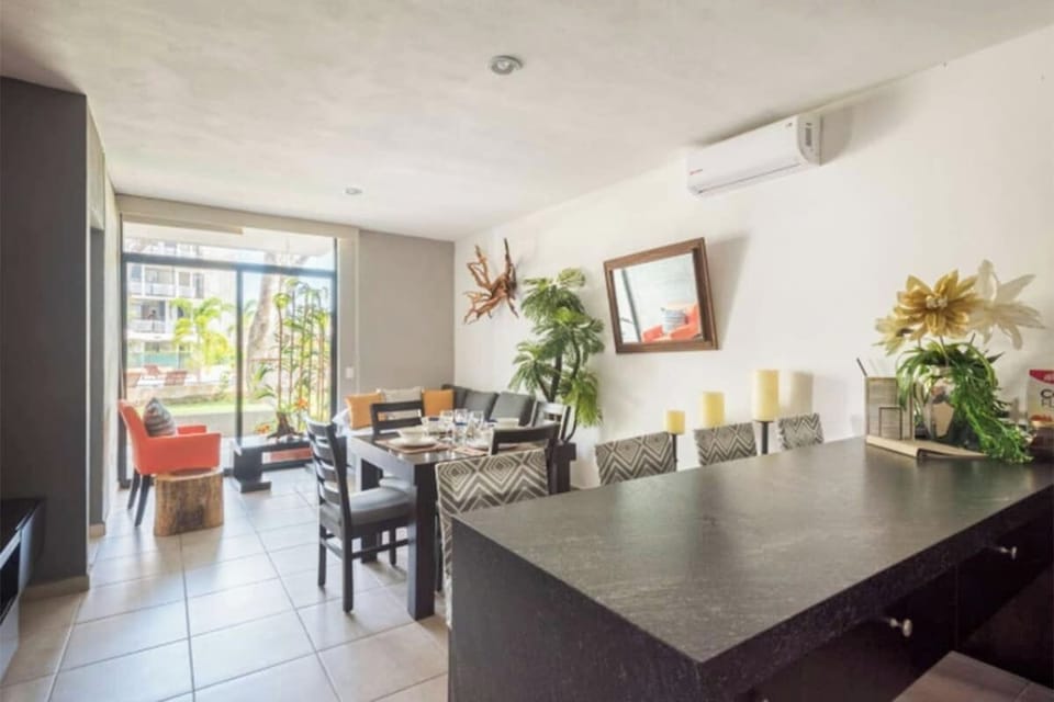 For sit-down meals, there's a dining table and breakfast bar