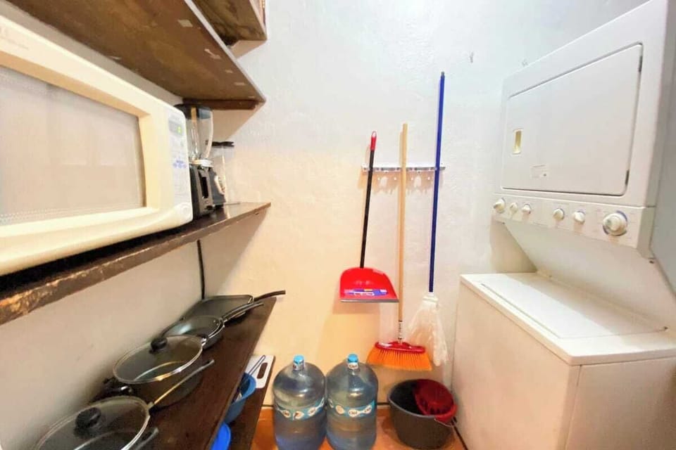 In-home washer and dryer plus some cleaning supplies
