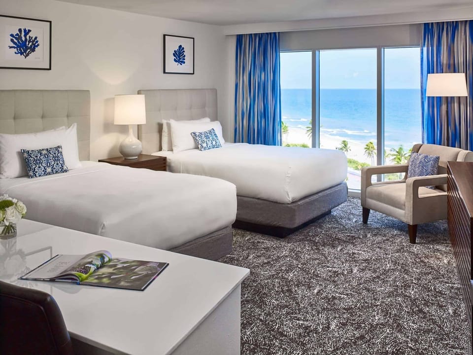 Wake to ocean views from plush beds and airy comfort.