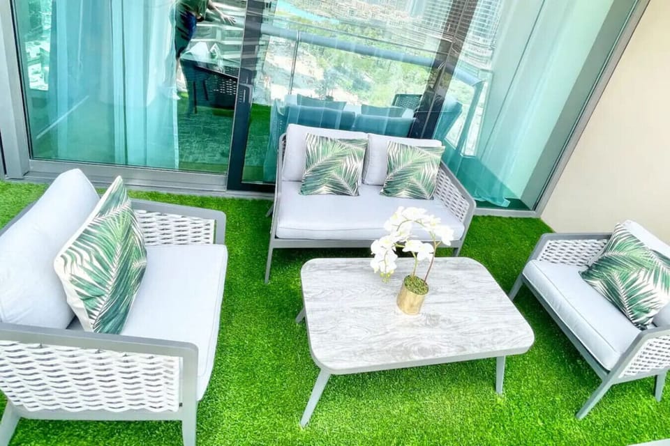 Balcony Oasis: Relax in style with stunning views and chic outdoor seating!