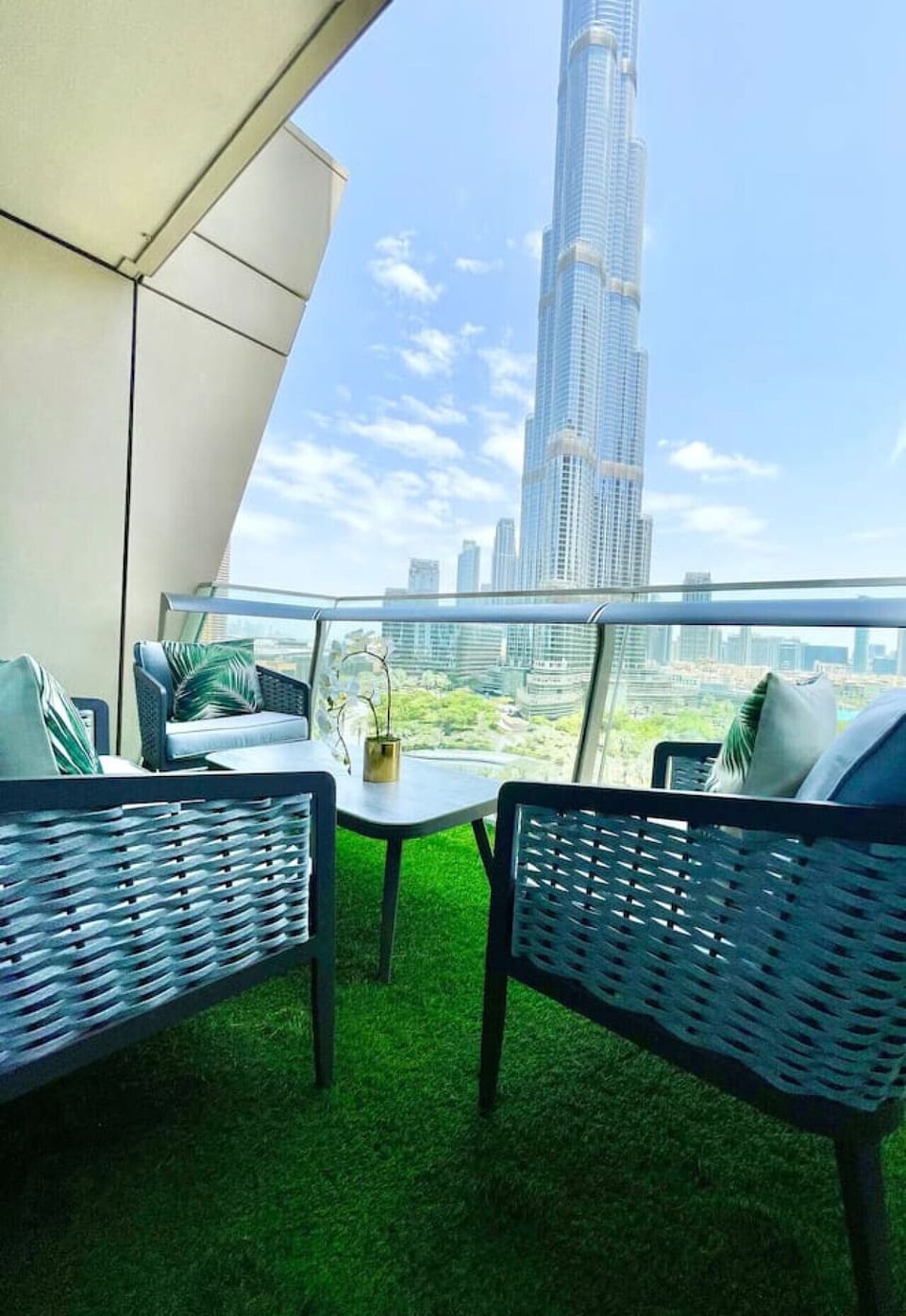 Balcony Oasis: Sip cocktails while soaking up stunning views of the Burj Khalifa!