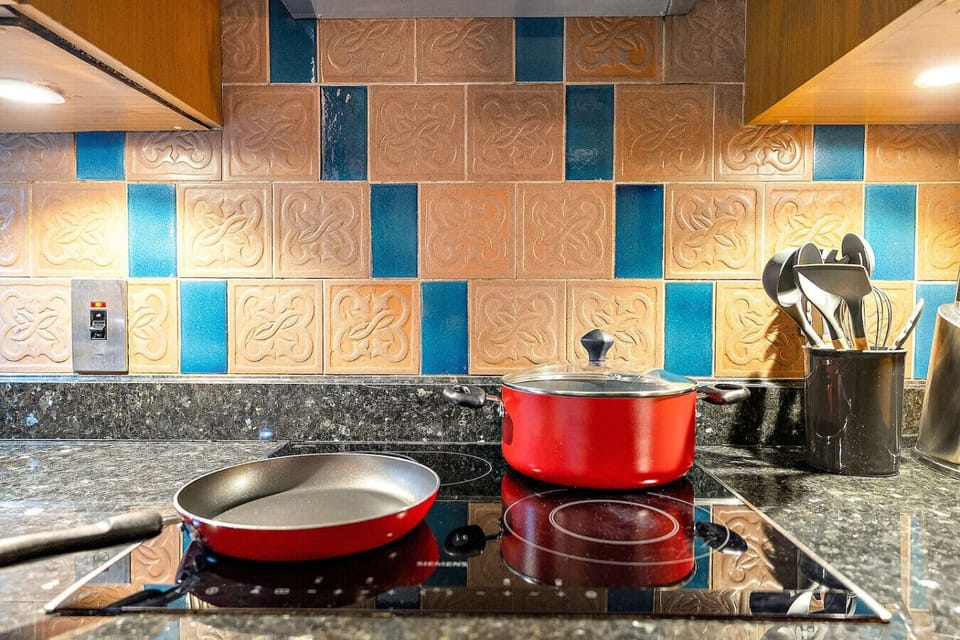 Kitchen: Unleash your inner chef in this vibrant culinary space with stylish accents!